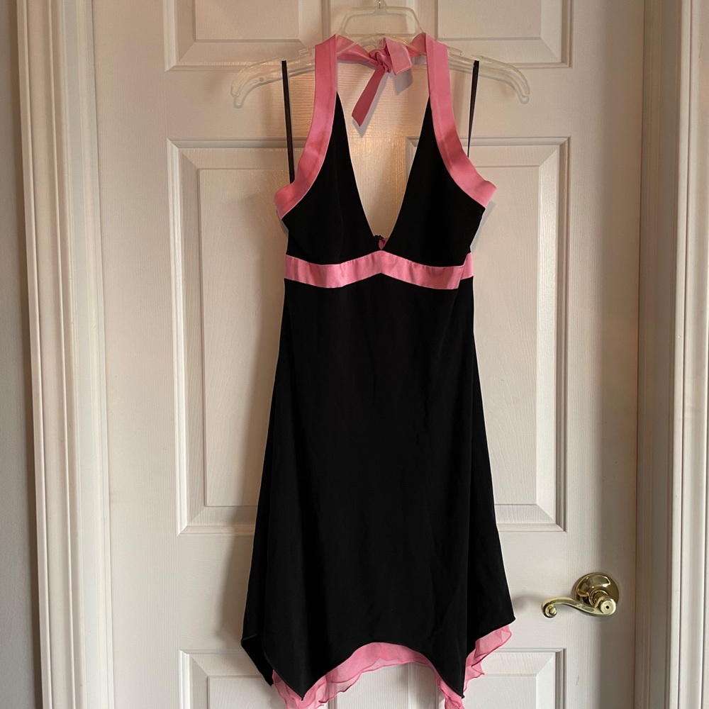 Bebe black dress with pink ribbon trim. Size Medium.